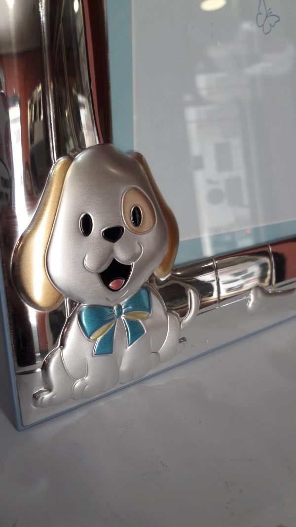 Marco niño perrito